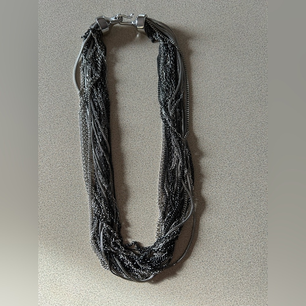 Multi-strand silver and black necklace